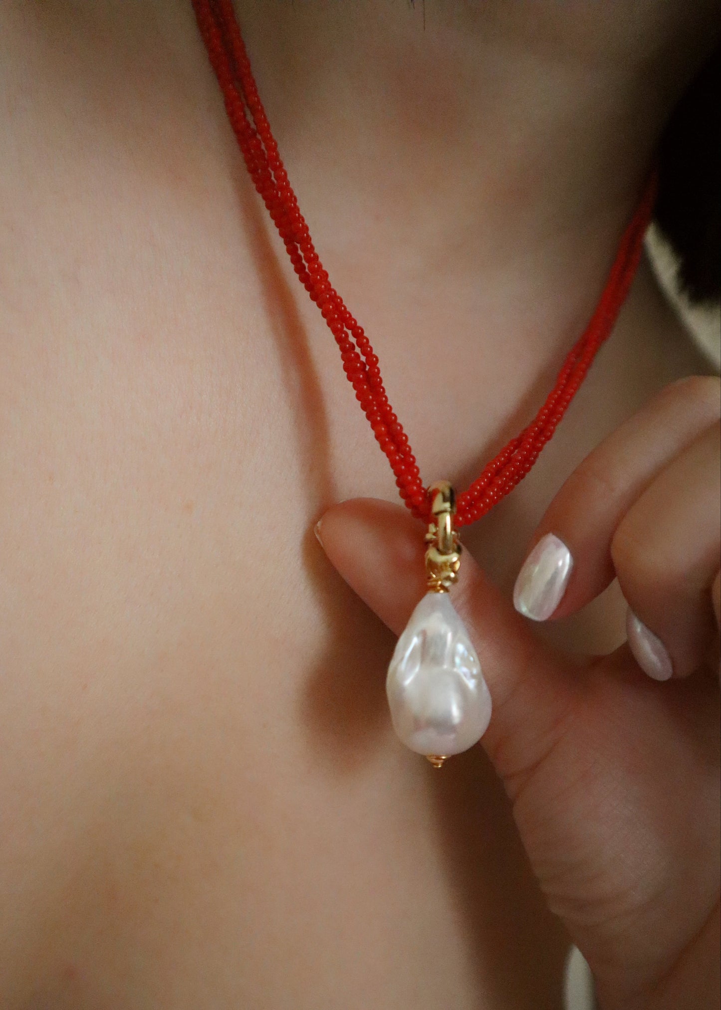 Quadruple coral necklace