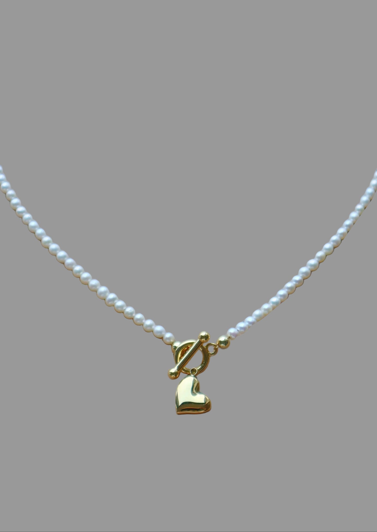 Pearl necklace with engravable heart pendant