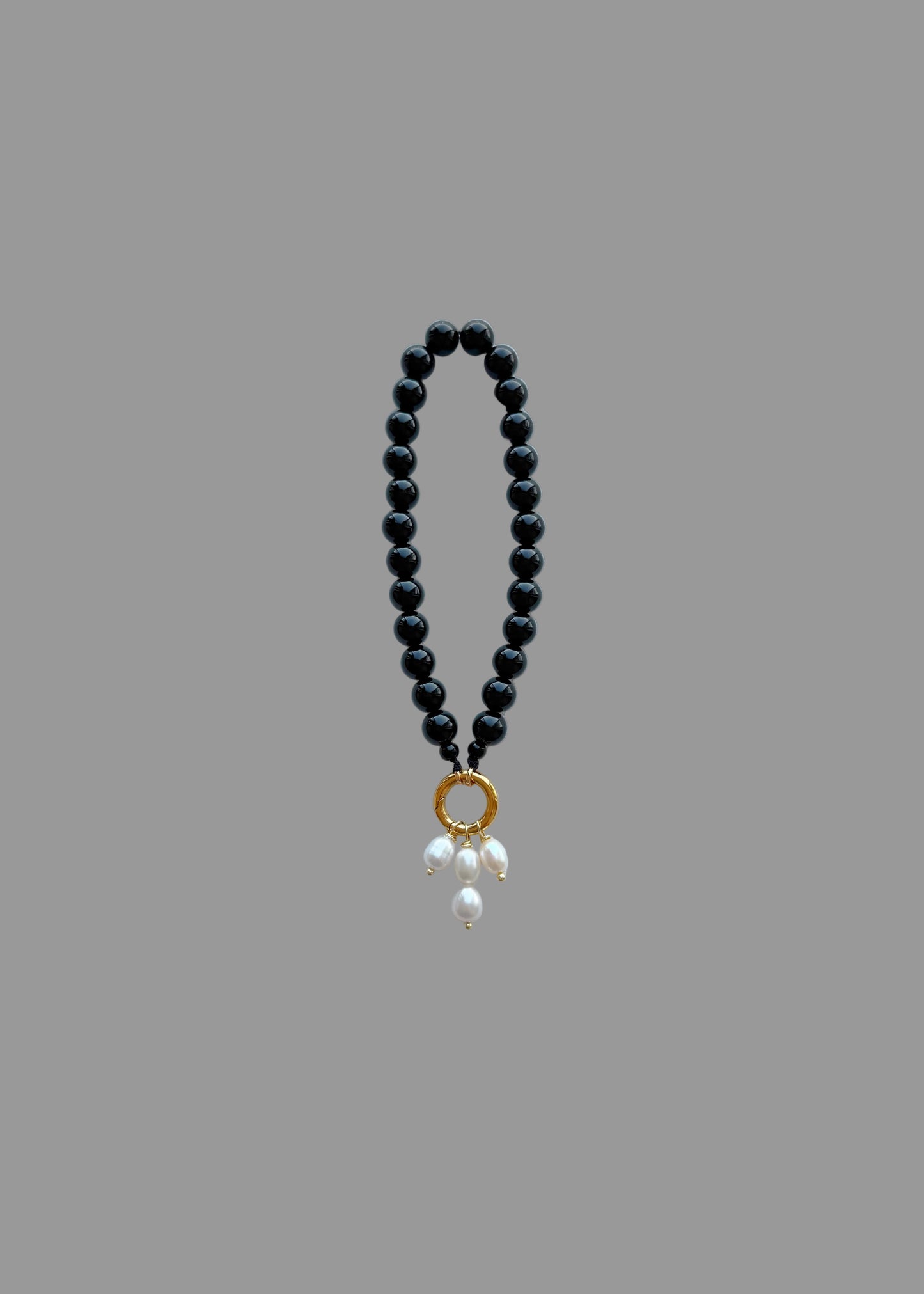 Black bag charm
